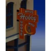 Miller Engineering 441452 HO/N Who's Hobby House Wall-Mount Animated Billboard - Your Source for Gaming Essentials* New